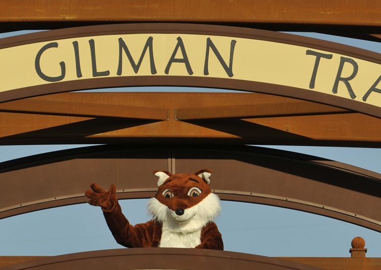 Fox mascot standing on V.L. Gilman Trail Bridge