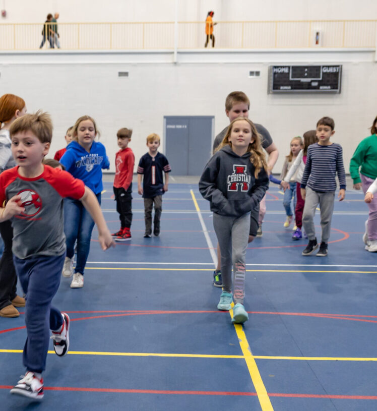 kids in gymnasium for winter blast camp
