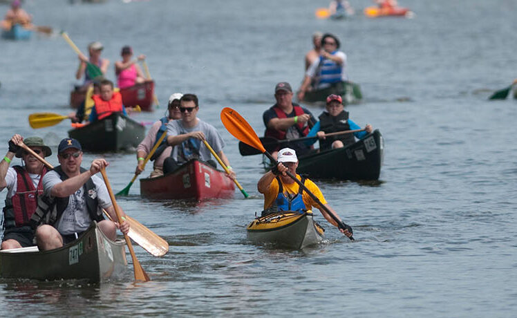 Paddlers in the Fox River participating in the Fox Valley Park District